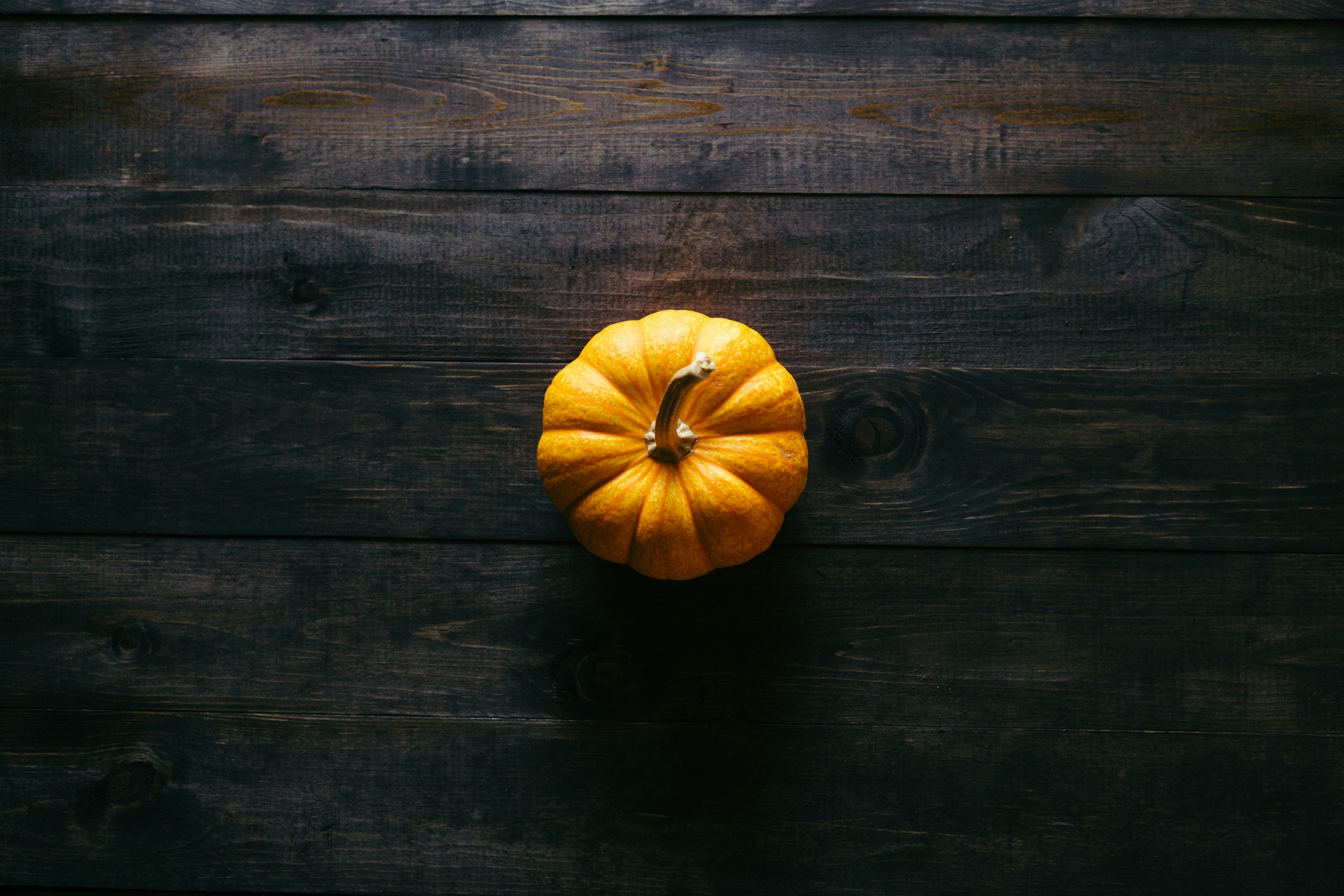 pumpkin on wooden board